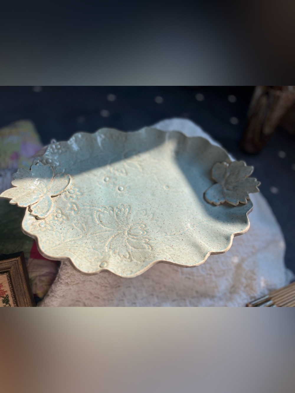 Handbuilt stoneware pottery w/ scalloped edge with texture and leaves soft green